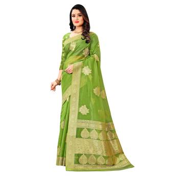 Green woven organza saree with blouse 1