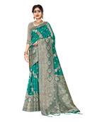 Teal woven organza saree with blouse