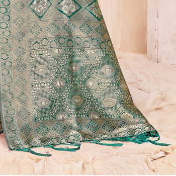 Teal woven organza saree with blouse 3