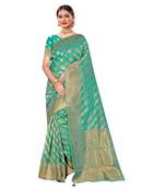 Green woven organza saree with blouse