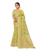 Parrot green woven organza saree with blouse