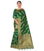 Green woven organza saree with blouse
