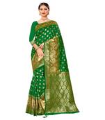 Green woven organza saree with blouse