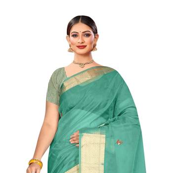 Sea green embroidered organza saree with blouse 2