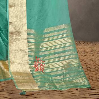 Sea green embroidered organza saree with blouse 3