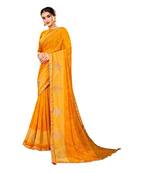 Yellow printed pure georgette saree with blouse