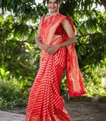 Red woven banarasi saree with blouse