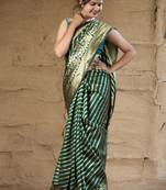 Green woven banarasi saree with blouse