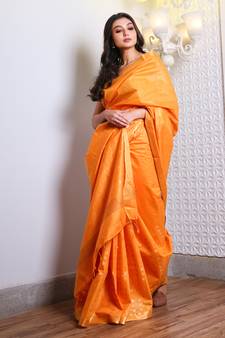 This is   Orange Blended Silk saree from Charukriti
