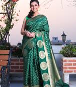 This is   Bottol Green Brocade Silk with traditional motiff from Charukriti
