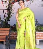 This is   Lime Green Brocade Silk with traditional motiff from Charukriti