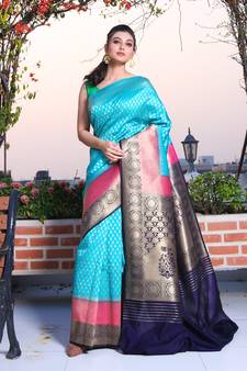 This is   Sky Blue Brocade Silk with zari weaving from Charukriti