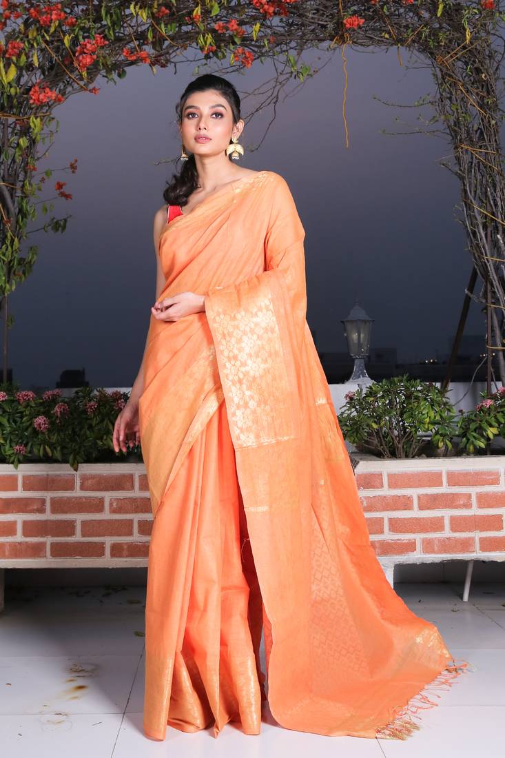 This is   Rust Blended Silk saree with Geomatric motiff in border from Charukriti