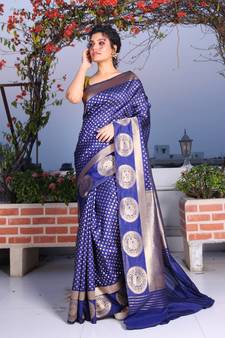 This is   Blue Brocade Silk with traditional motiff from Charukriti