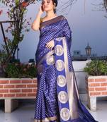 This is   Blue Brocade Silk with traditional motiff from Charukriti