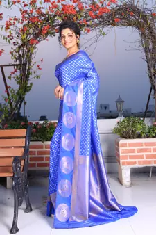 This is   Cobult Blue Brocade Silk with traditional motiff from Charukriti
