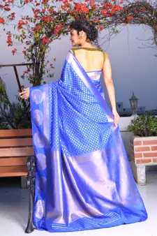 This is   Cobult Blue Brocade Silk with traditional motiff from Charukriti