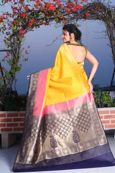 This is   Golden Yellow Brocade Silk with zari weaving from Charukriti