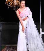 This is   White Cotton textured design handwoven saree from Charukriti