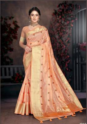 Peach woven organza saree with blouse 1