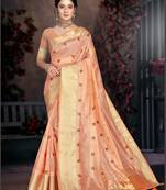Peach woven organza saree with blouse