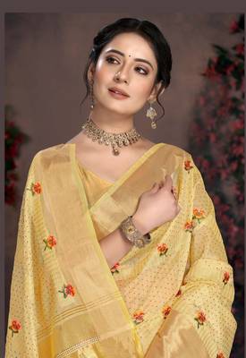 Yellow woven organza saree with blouse 2