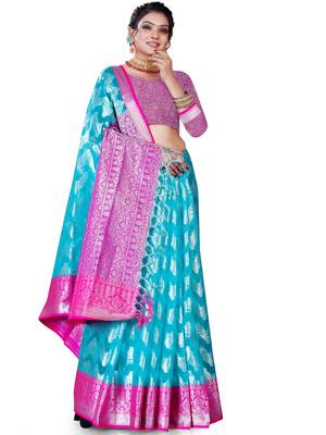 Turquoise woven organza saree with blouse 1