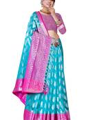 Turquoise woven organza saree with blouse
