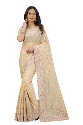 Beige embroidered organza saree with blouse 1