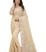Beige embroidered organza saree with blouse