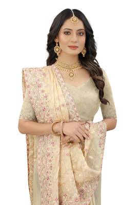 Beige embroidered organza saree with blouse 2