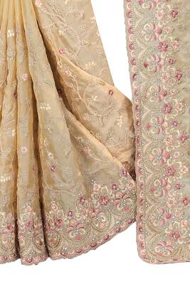 Beige embroidered organza saree with blouse 3