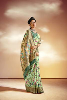 Light green woven silk saree with blouse 2