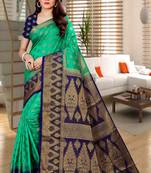 Green woven faux kanjivaram silk saree with blouse