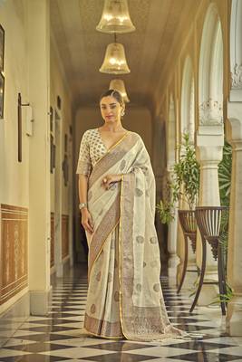 Ivory woven linen saree with blouse 1