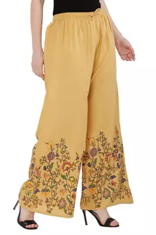 Women Peach Solid Relaxed Flower Print Rayon Palazzo Pants with Elastic Drawstring (Free Size)