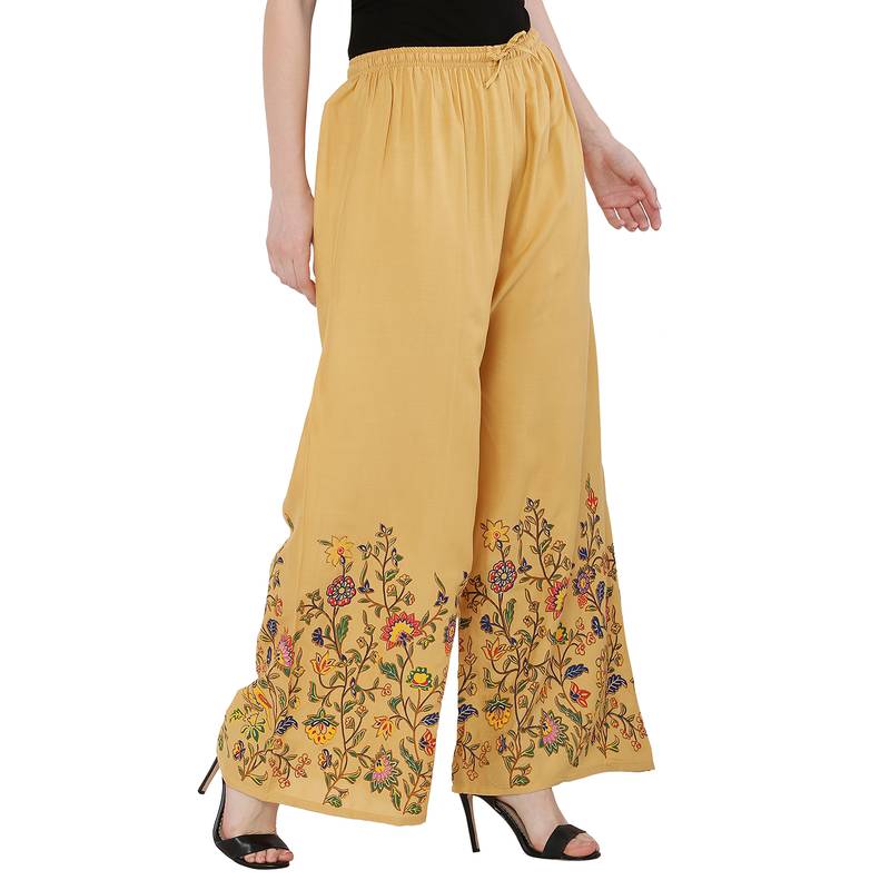 Women Peach Solid Relaxed Flower Print Rayon Palazzo Pants with Elastic Drawstring (Free Size)