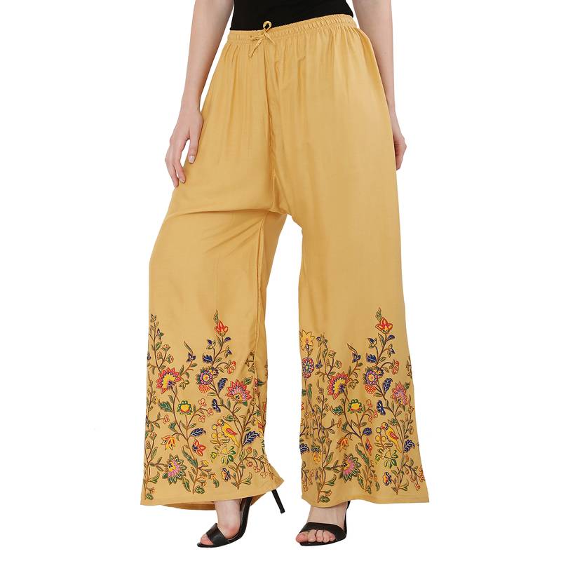 Women Peach Solid Relaxed Flower Print Rayon Palazzo Pants with Elastic Drawstring (Free Size)