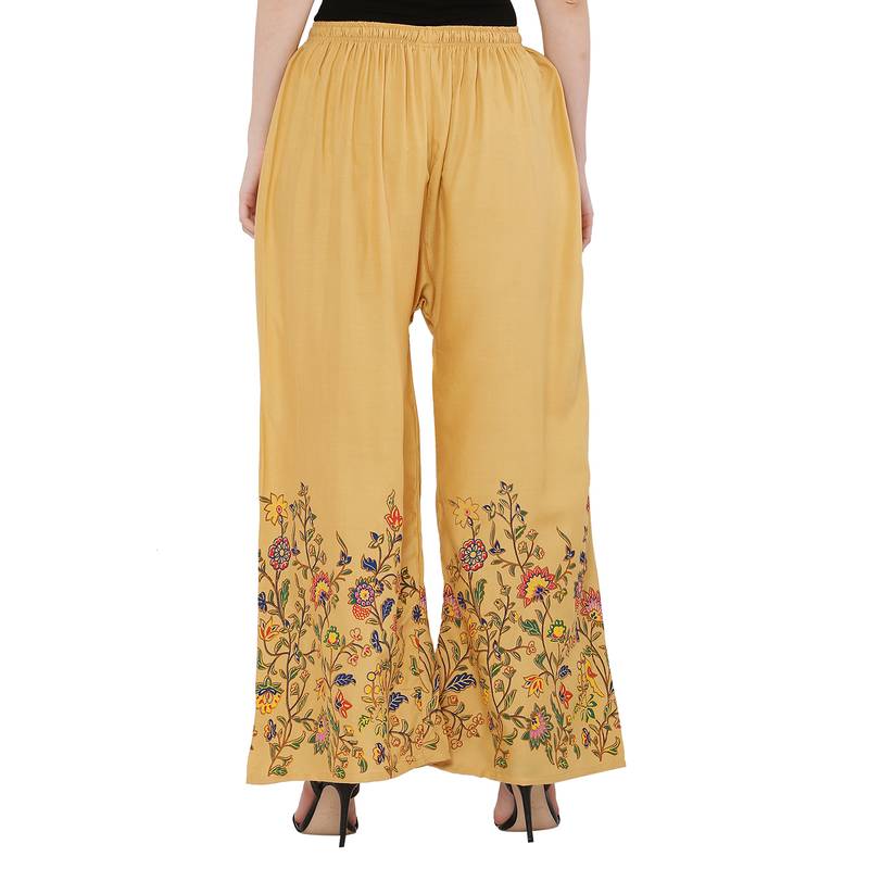 Women Peach Solid Relaxed Flower Print Rayon Palazzo Pants with Elastic Drawstring (Free Size)