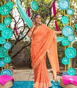 Orange printed linen saree with blouse