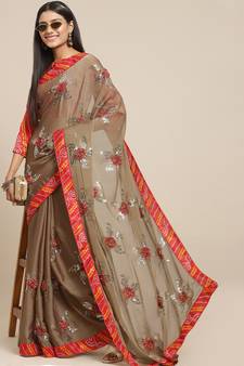 Beige embroidered chiffon saree with blouse