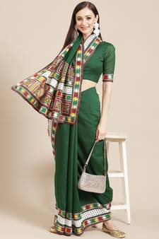 Green embroidered silk blend saree with blouse