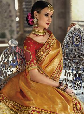 Orange woven silk saree with blouse 2