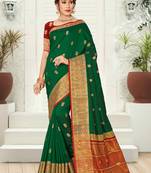 Dark green woven silk saree with blouse