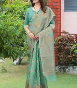   turquoise woven cotton saree with blouse