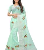 Green embroidered cotton saree with blouse