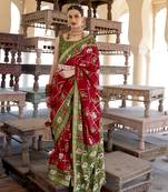 Red woven silk saree with blouse