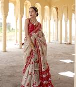 Ivory woven silk saree with blouse