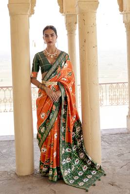 Orange woven silk saree with blouse 1
