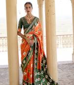 Orange woven silk saree with blouse